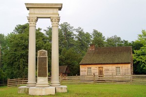 The Unity Monument with the replica of James Bennett’s farmhouse in the background.